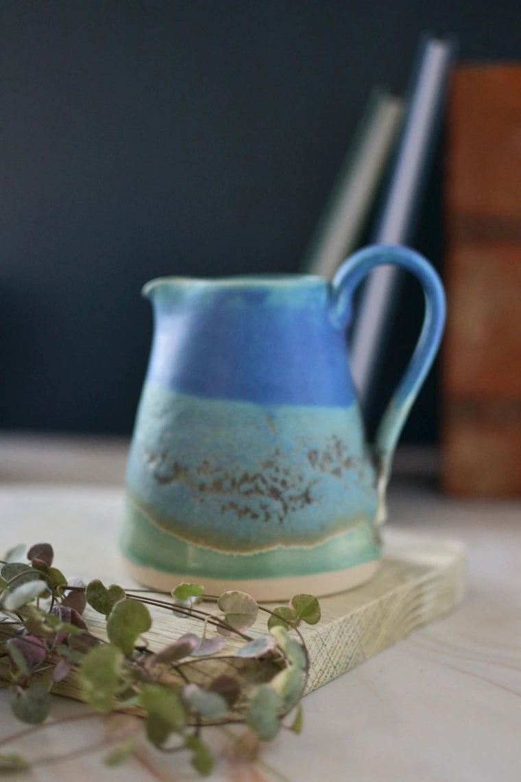 Handmade ceramic medium jug - decorated in blues and turquoise glazes