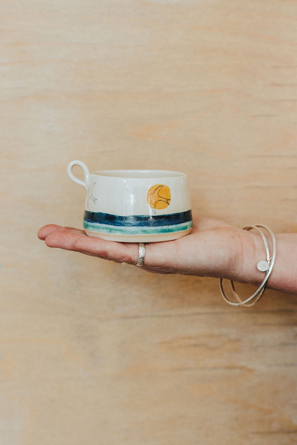 Ceramic handmade tea light cup - Golden Swift design