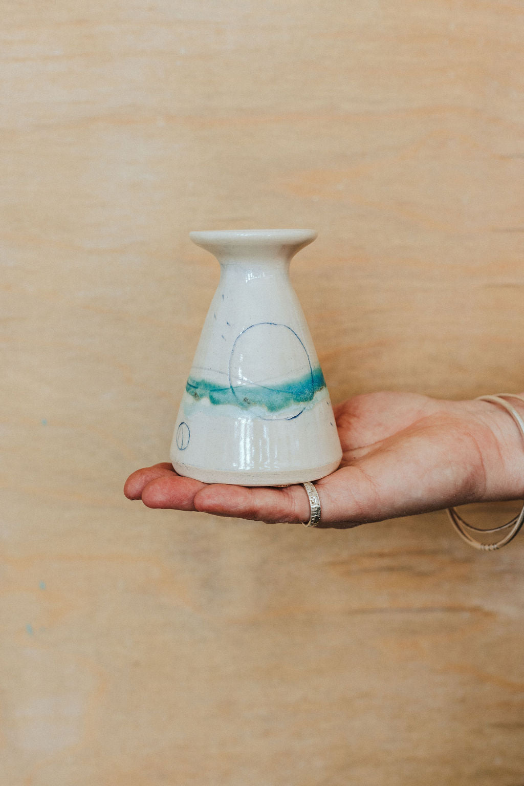 Handmade ceramic flared bud vase - glazed in pale sea colours