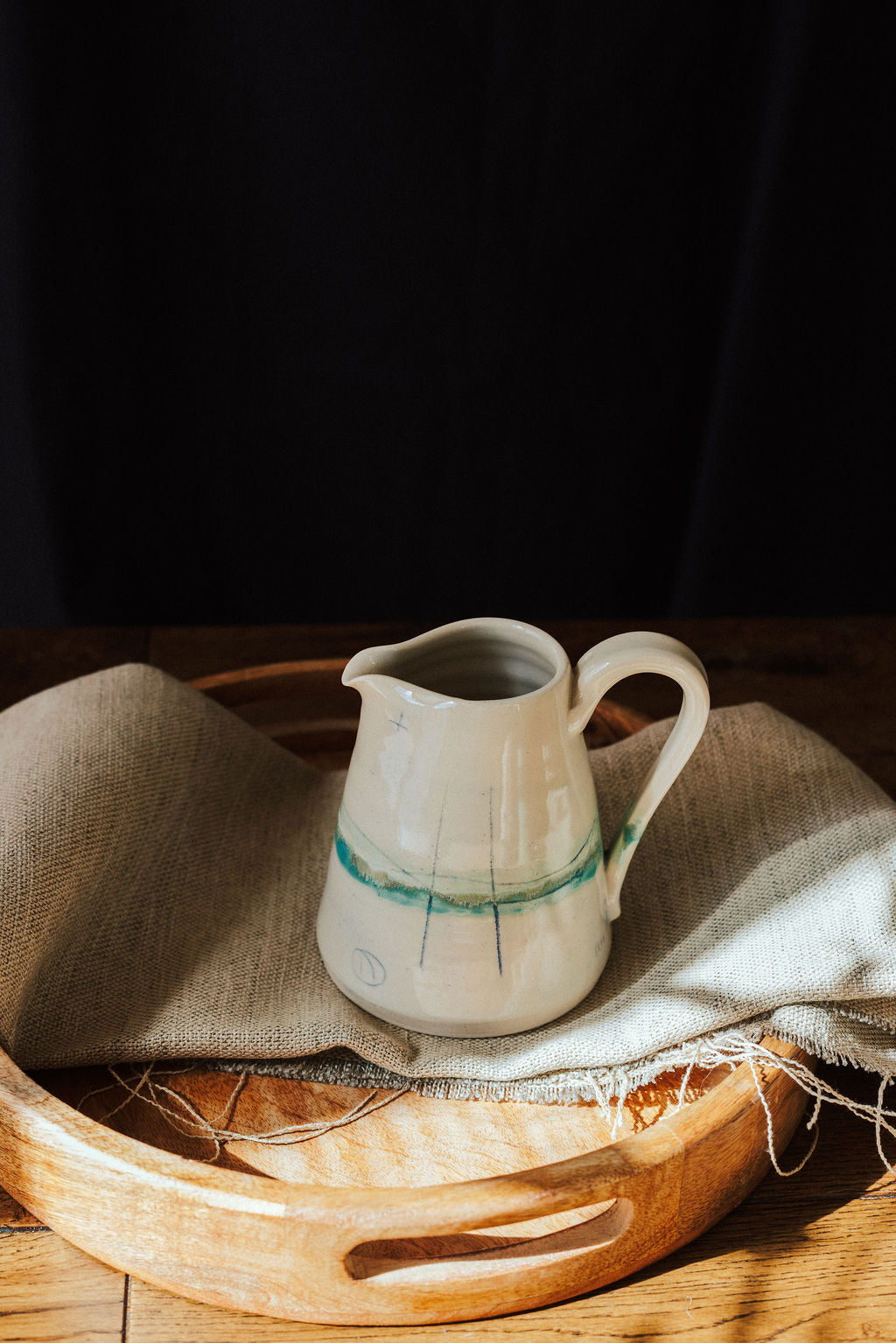 Handmade ceramic small jug - decorated in pale sea coloured glazes
