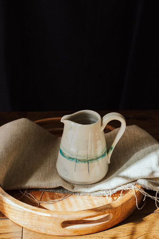 Handmade ceramic small jug - decorated in pale sea coloured glazes