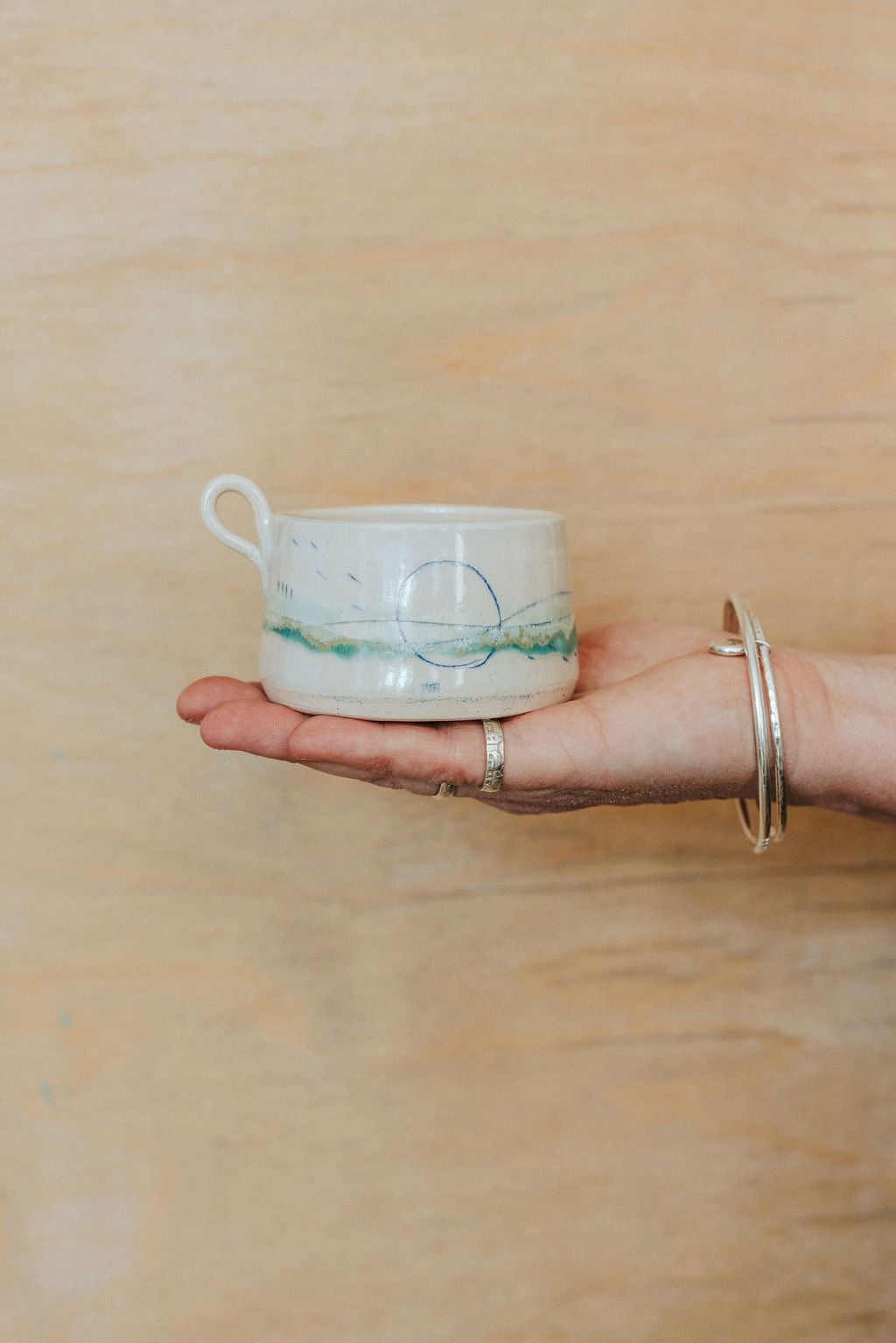Ceramic handmade tea light cup - Glazed in pale sea colours