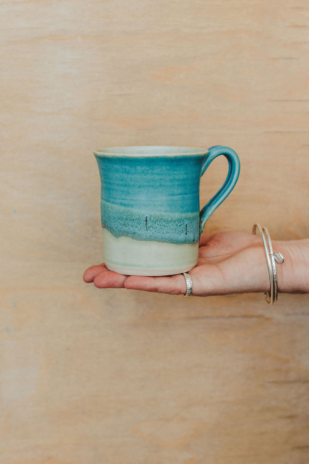 Ceramic handmade stoneware mug - glazed in sea inspired colours to take you to the sea