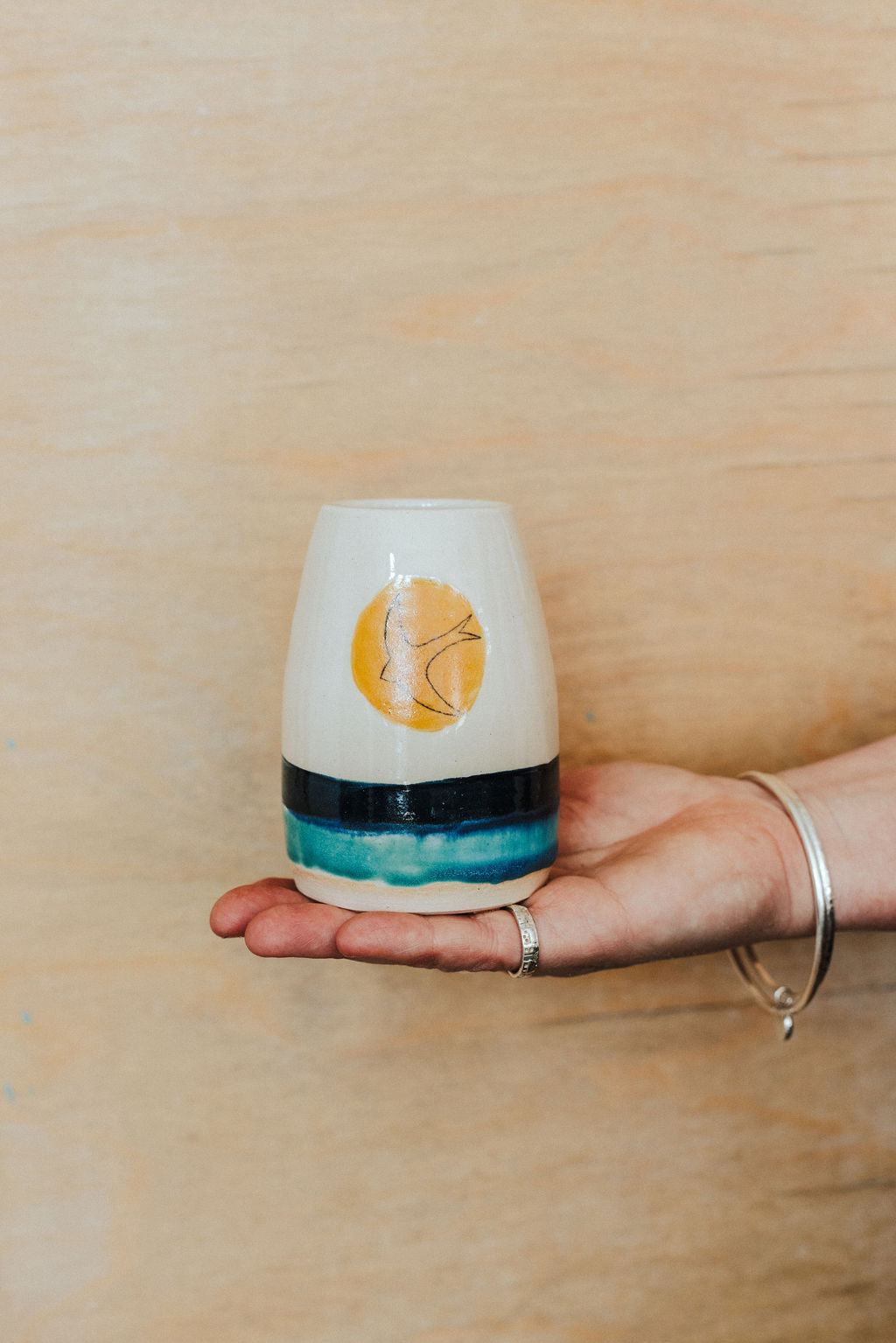 Handmade ceramic posy vase - decorated with a golden sun and Swift