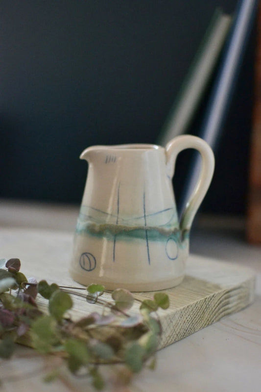 Handmade ceramic small jug - decorated in pale sea coloured glazes