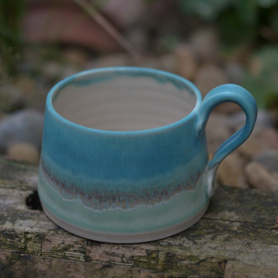 A cup thrown on the potters wheel, handmade in Yorkshire, UK